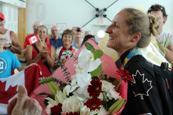 Olympic bronze medal winner Catharine Pendrel arrives at the Kamloops Airport.