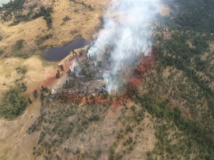 Weather is helping fire crews contain the Kokanee road wildfire. 