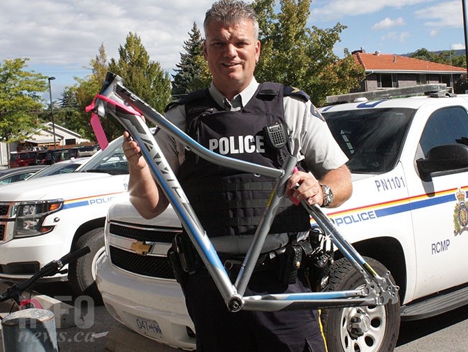 Penticton RCMP Cpl. Don Wrigglesworth displays a Jamis graphite bike frame recovered by the detachment.