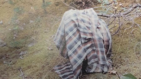 Pictured is the long-sleeved, plaid shirt the unidentified man was wearing.