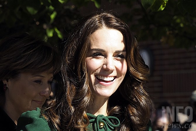 The Duchess of Cambridge smiles as she is greeted by hundreds of spectators at UBC Okanagan, accompanied by B.C. Premier Christy Clark.