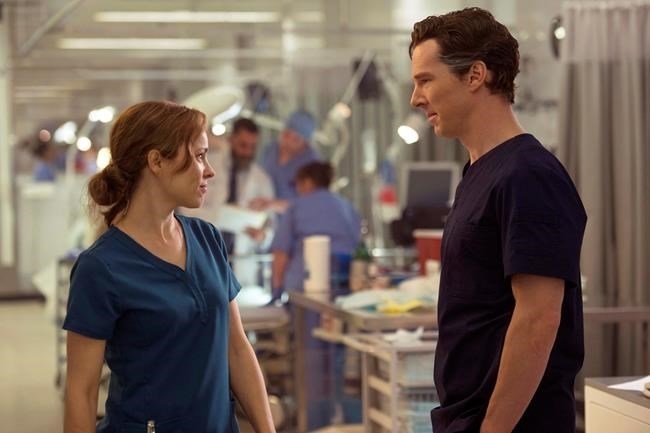 This image released by Disney shows Rachel McAdams, left, and Benedict Cumberbatch in a scene from Marvel's 