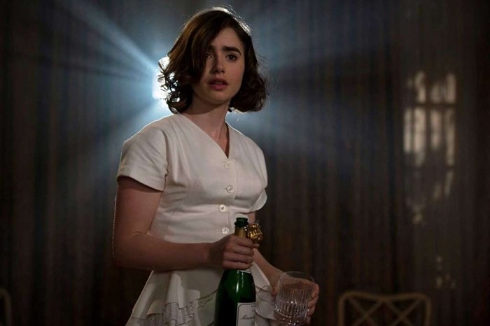 This image released by Twentieth Century Fox shows Lily Collins in a scene from 