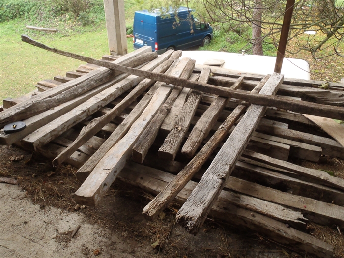 Salvaged wooden beams to be used for construction in Olot, Spain.