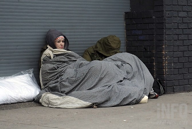 Cheralyn Redford is breaking a new Kelowna bylaw that makes sitting or sleeping on the sidewalk punishable by a $50 fine. 