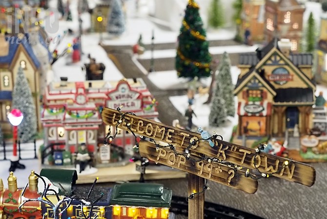 Kathy Bernard's K-Town is home to more than 100 miniature who ski, cut wood, shop, skate and visit with Santa. She creates it in her basement for her grandchildren.
