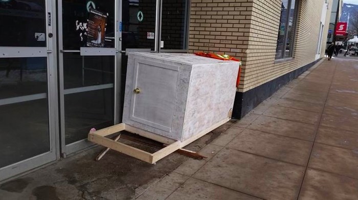 The crate was set up outside the old Liquidation World building for a while. 
