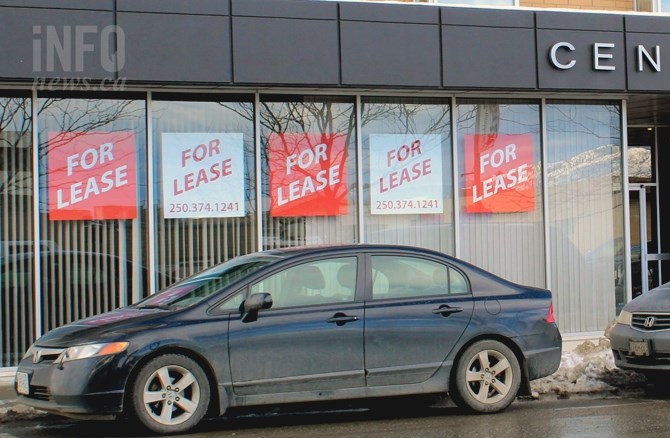 Lease signs along Seymour St. advertise empty storefront space.