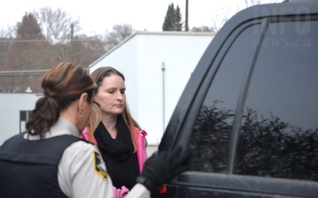 Lori Victoria Vance is escorted from the Vernon courthouse following a sentence hearing Fevb. 27, 2017. 