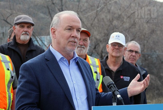 B.C. NDP leader John Horgan discussing forestry in front of the Domtar pulp mill in Kamloops, March 27, 2017.