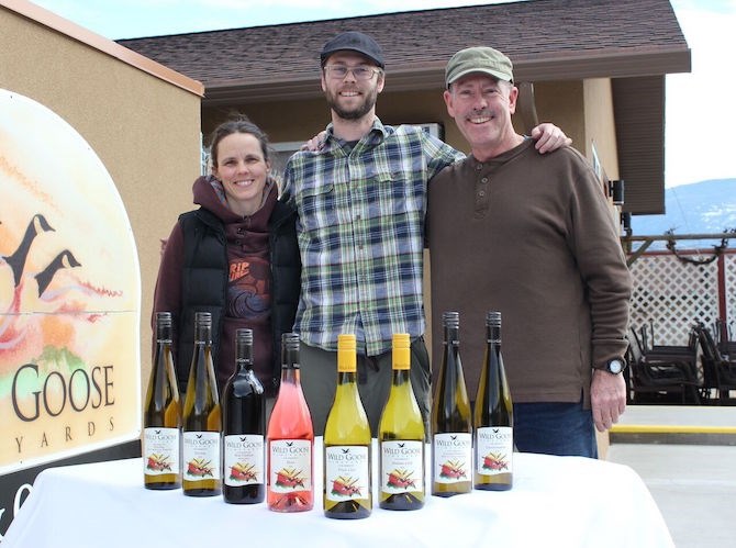 From left to right: Tanya Booth (cellar hand), Nik Kruger (winemaker) and Hagen Kruger (managing winemaker) all stand with their award winning wines from the fifth annual Cascadia Wine Competition. 