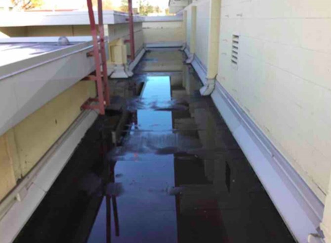 Pooling water can be seen on the roof of the mechanics garage at the Penticton city yards in this submitted photo. Council will be asked to replace or repair the roof at the regular council meeting tomorrow, April 18, 2017.