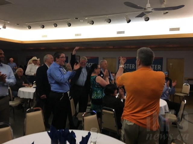 Crowd goes wild after Foster wins his seat.