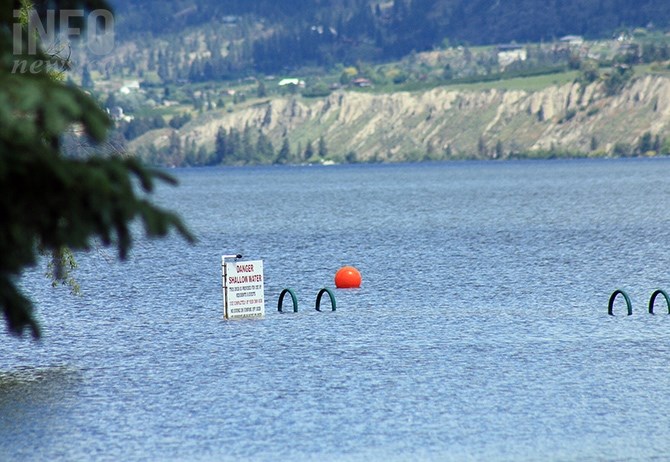 Not so shallow anymore: A dock at Red Wing, normally in shallow water, is now submerged and more than 30 metres from shore as Okanagan Lake continues to rise.
