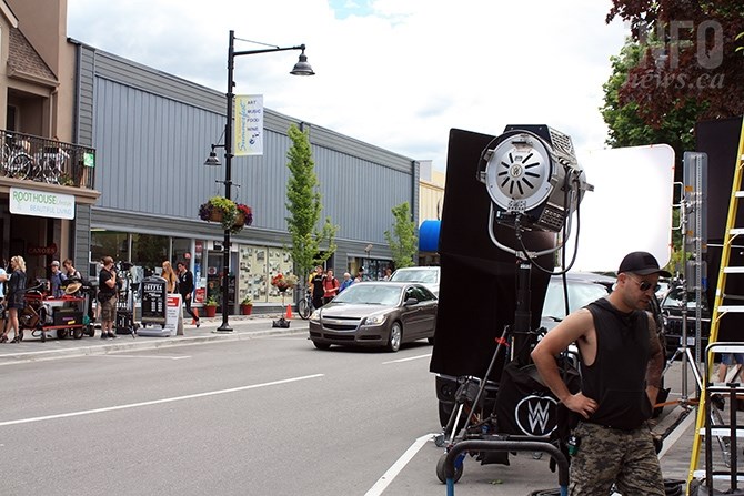Business continued as usual on Penticton's 200 block of Main this morning as a movie set filmed on the street.