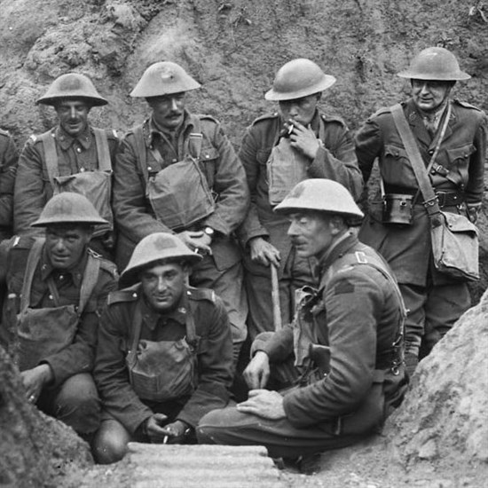 Historians believe the man in the top row with his head down and smoking a cigarette may be Frederick Lee. This image is of the 47 Battalion at the Battle of Hill 70.
