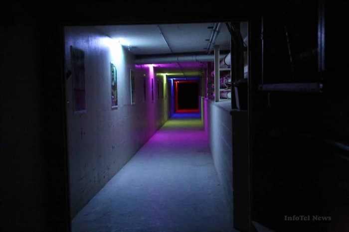 Colourful lights lead the way into the tunnels under the old sanatorium in Kamloops, where you are quickly enveloped in darkness.