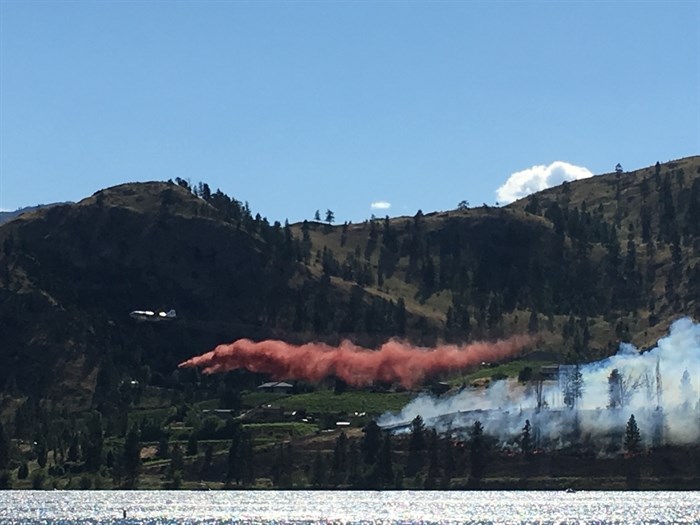 Fixed wing aircraft dropped retardant on the blaze sometime before 5:30 p.m. July 4, 2017. 