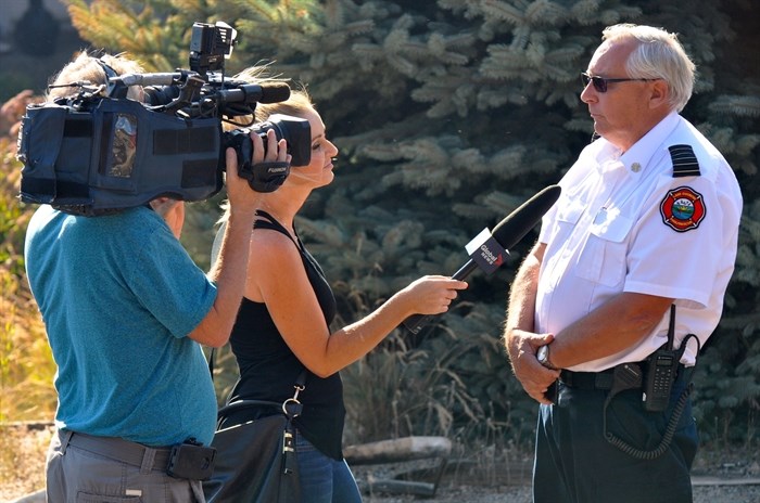 Lake Country fire chief Steve Windsor talks to the media.