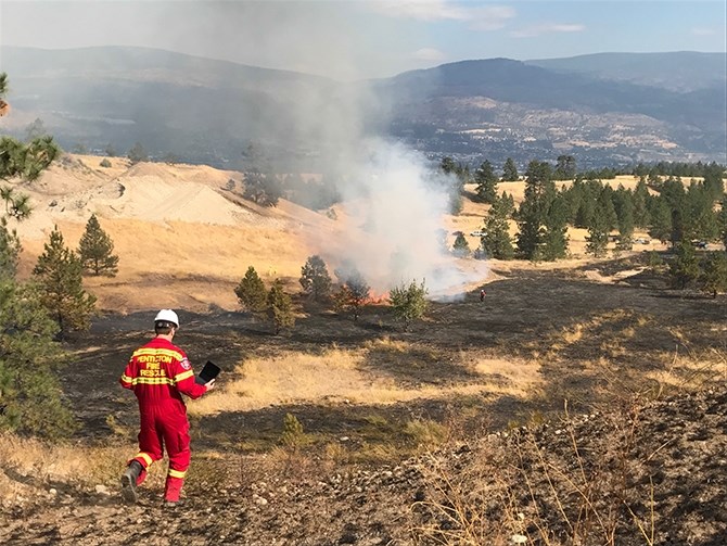 Penticton Indian Band, city and B.C. Wildfire crews are fighting a grass fire near the Westhills Aggregates gravel pit on West Bench, Friday, Sept. 1, 2017.