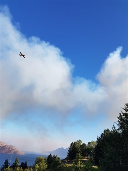 Aircraft going towards the Peachland wildfire.