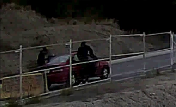 Surveillance footage shows the two suspects entering the vehicle on Sept. 21.