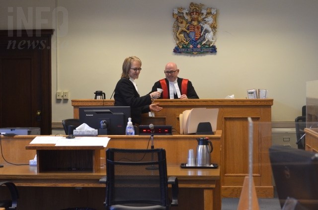 Judge Richard Hewson in court with provincial family court clerk Giselle Wood. 