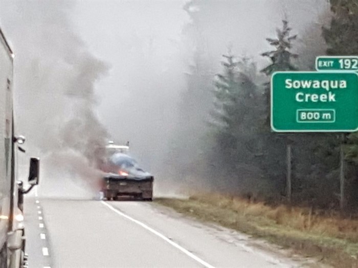 The Coquihalla Highway was closed Tuesday morning due to a burning semi.