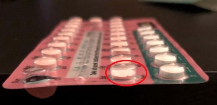 Side view of Alesse 28 blister back with broken pill circled in red.