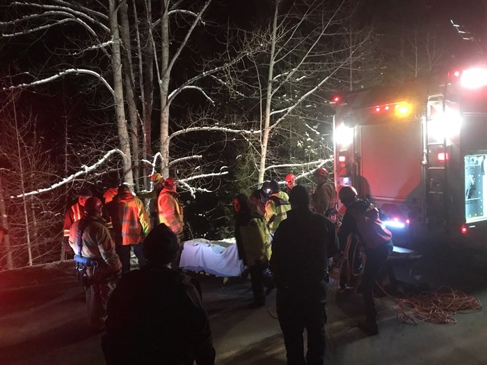 Vernon Search and Rescue members couldn't wait for a winch to pull Caroline Koenig up the 150- to 200-foot embankment — she was already suffering from hypothermia after being exposed to the elements for nearly 12 hours by that time. 