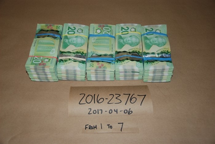 Cash RCMP say was seized from Brandon Chappell's home in Kamloops.