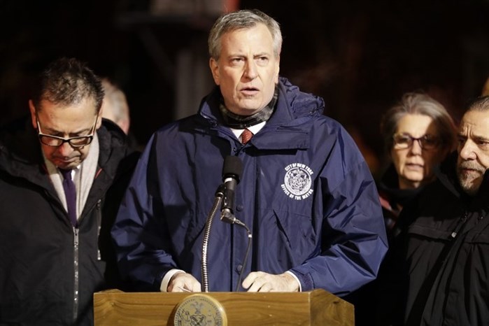 New York City mayor Bill de Blasio speaks during a news conference after fire crews responded to a building fire Thursday, Dec. 28, 2017, in the Bronx borough of New York.