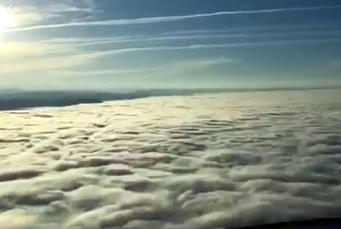 VIDEO: Pilot landing at YLW makes dramatic break through clouds ...