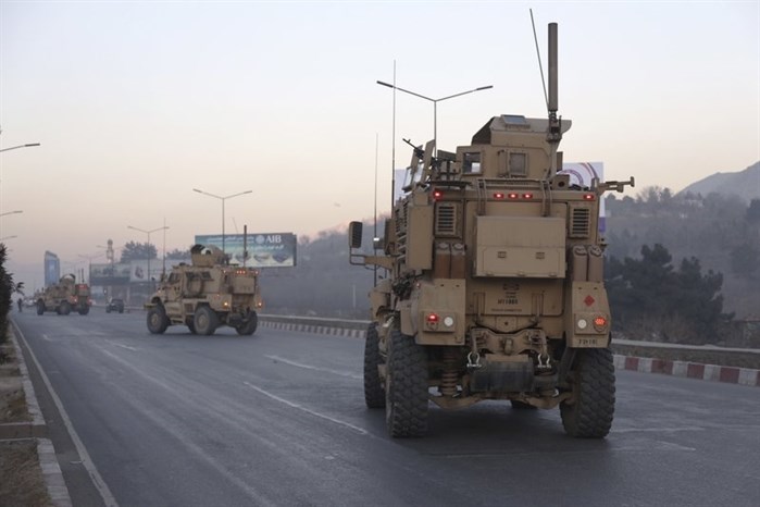 U.S. forces arrive near the Intercontinental Hotel after an attack in Kabul, Afghanistan, Sunday, Jan. 21, 2018.