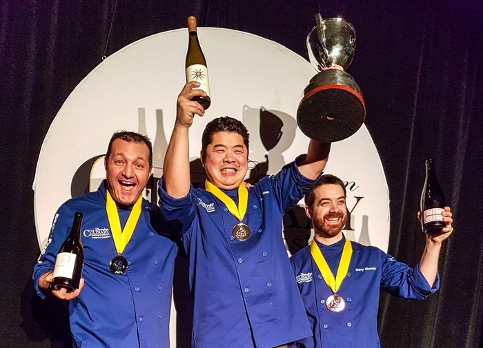 KELOWNA-  Chefs Eric Gonzalez, Alex Chen, and Barry Mooney (left to right) celebrating victory for placing in the top three at the 2018 Canadian Culinary Championships in Kelowna B.C. on Saturday, Feb. 3, 2018. 