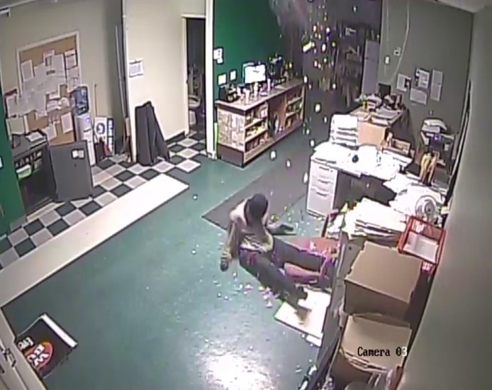 Video footage captured the suspect crashing through the ceiling. 