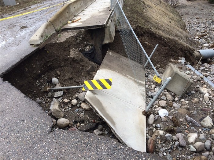 A washout has closed Lower Glenrosa Road between Glencoe Road and Glenway Road in West Kelowna, Friday, March 23, 2018.