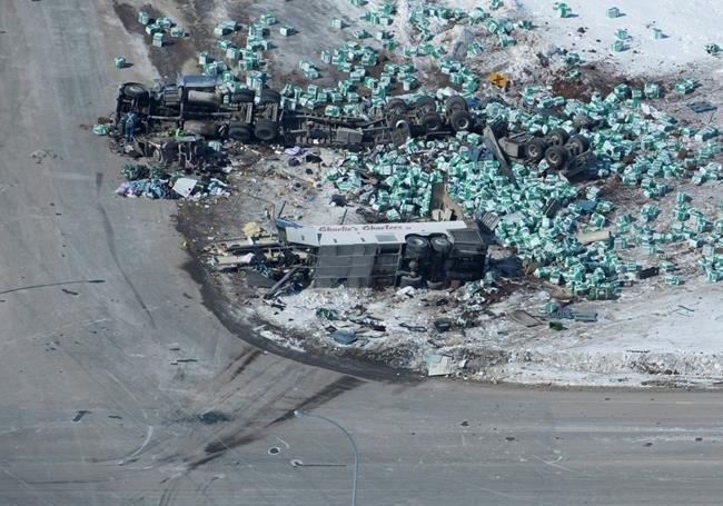 The wreckage of a fatal crash outside of Tisdale, Sask., is seen Saturday, April, 7, 2018. A bus carrying the Humboldt Broncos hockey team crashed into a truck en route to Nipawin for a game Friday night killing 14 and sending over a dozen more to the hospital.
