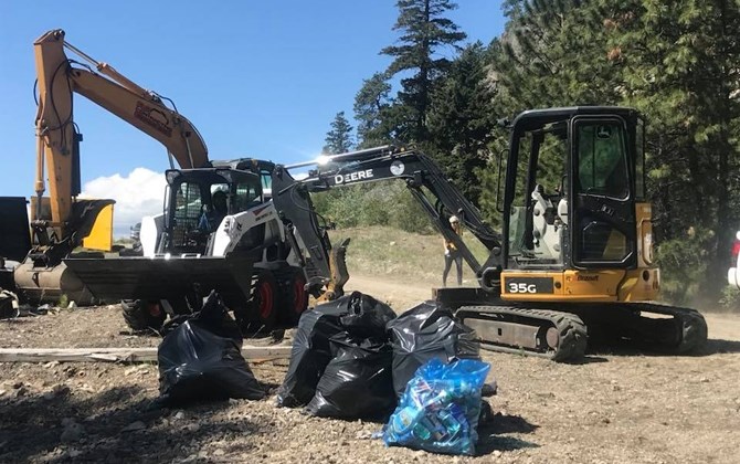 Roughly 30 volunteers helped clean a backcountry garbage dump near Peachland last weekend. 