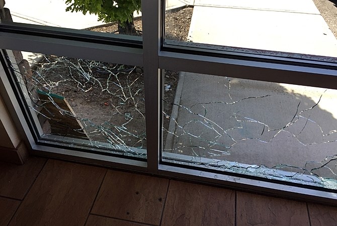 The windows of Thai Fusion in West Kelowna were smashed by an unknown vandal multiple times in 2015 and 2016.
