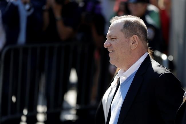 Harvey Weinstein leaves the first precinct of the New York City Police Department after turning himself to authorities following allegations of sexual misconduct, Friday, May 25, 2018, in New York. Police say Weinstein has been arrested on rape, criminal sex act, sex abuse and sexual misconduct charges for encounters with two women.