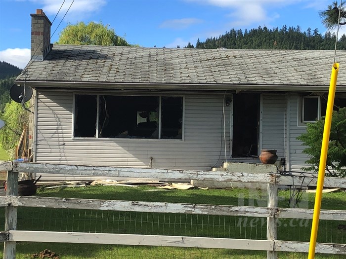 Firefighters put out a house fire in the 6500 block of Barnhartvale Road in Kamloops, Monday, June 4, 2018.