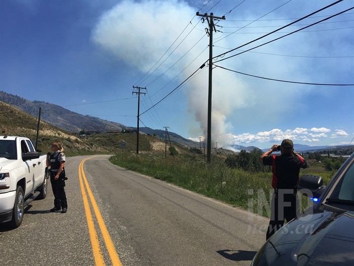 Emergency crews are on the scene of a grass fire along Shuswap Road in Kamloops, Thursday, July 12, 2018.
