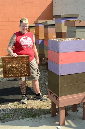 Dawn Tucker with her bees at a secret Vernon location.