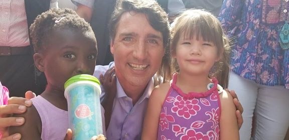 Two four year-olds Ednaline Steves (left) and Oceana Desmasdon meet Prime Minister Justin Trudeau at the B.C. Day Picnic in Penticton.