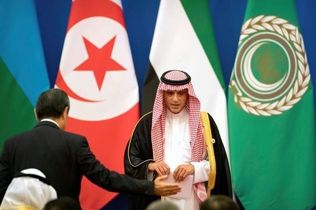 Saudi Arabia's Foreign Minister Adel al-Jubeir leaves the stage after speaking during the opening session of the 8th Ministerial Meeting of the China-Arab States Cooperation Forum in Beijing, Tuesday, July 10, 2018. Saudi Arabia's foreign minister says there is nothing to mediate when it comes to the diplomatic dispute between his kingdom and Canada and is stepping up retaliation including selling Saudi-owned Canadian assets. 