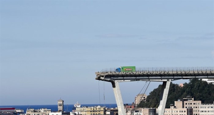 A view of the collapsed Morandi highway bridge. A large section of the bridge collapsed over an industrial area in the Italian city of Genova during a sudden and violent storm.