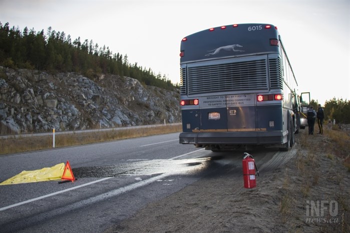 The oil slick can be seen trailing from the bus.