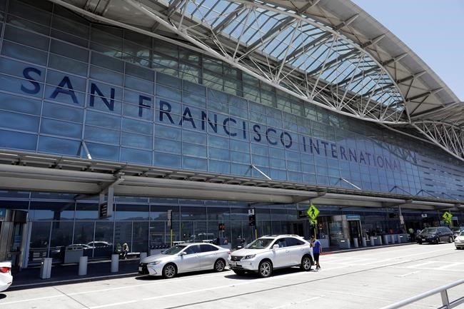 FILE - In this July 11, 2017, file photo, vehicles wait outside the international terminal at San Francisco International Airport in San Francisco.