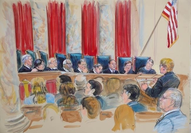 This courtroom sketch depicts Attorney Brenda G. Bryn, far right standing, speaking in front of from l-r, Associate Justice Neil Gorsuch, Associate Justice Sonia Sotomayor, Associate Justice Stephen Breyer, Associate Justice Clarence Thomas, Chief Justice of the United States John Roberts, Associate Justice Ruth Bader Ginsburg, Associate Justice Samuel Alito Jr., Associate Justice Elena Kagan and Associated Justice Brett Kavanaugh, at the Supreme Court in Washington, Tuesday, Oct. 9, 2018. Also present as a guest of the court is retired Associate Justice Anthony Kennedy, lower right hand corner seated.